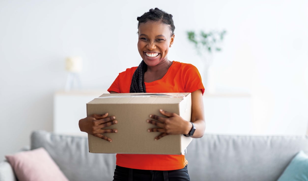 Woman holding a package Woman holding a package